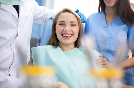 Happy Girl in Dental Chair when Pain Stopped, Richmond Family Dentistry